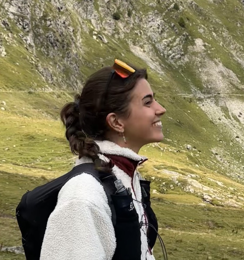 Anna Oliveras Tous smiling outdoors in the mountains